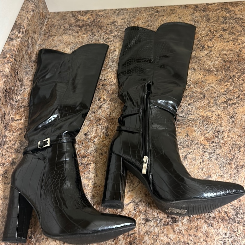 Knee high snakeskin boots